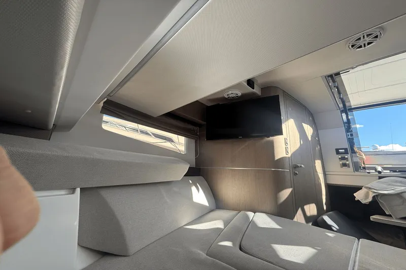 Slide: The Image of Interior of 2024 Galeon 325 GTO with cozy seating area. - 31