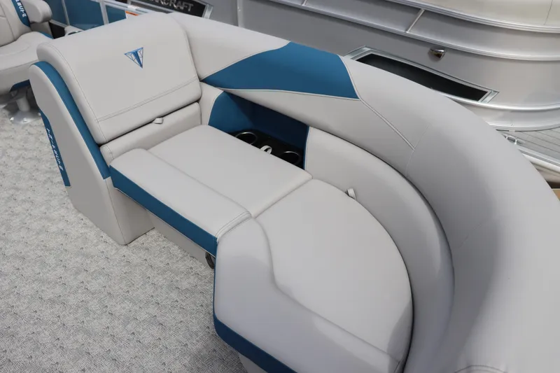 Slide: The Image of Luxurious seating on 2025 Trifecta 22 RF LE 2.75 pontoon boat, featuring blue and gray upholstery. - 3