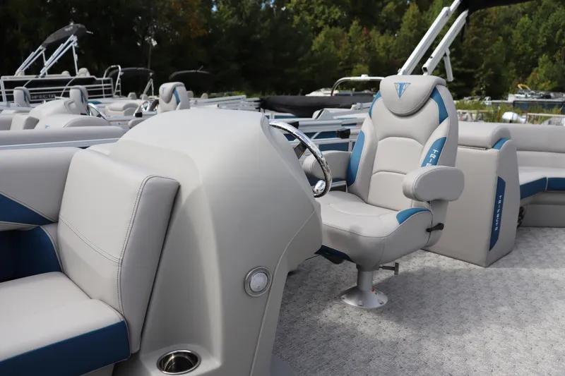 Slide: The Image of Luxurious interior of 2025 Trifecta 22 RF LE 2.75 pontoon boat with plush seating. - 5