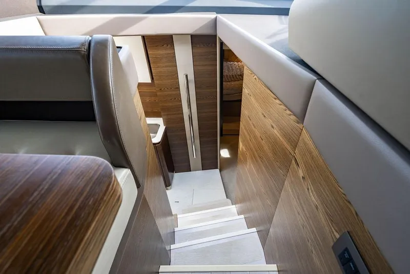 Slide: The Image of Interior stairs of 2015 Azimut Fly 50 yacht with wood paneling and modern design. - 100