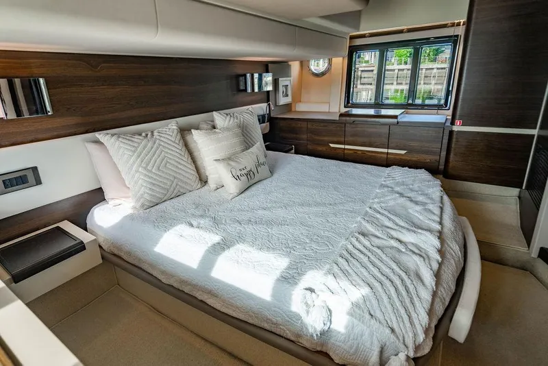 Slide: The Image of Luxurious bedroom interior of 2015 Azimut Fly 50 yacht with elegant bedding and modern design. - 111