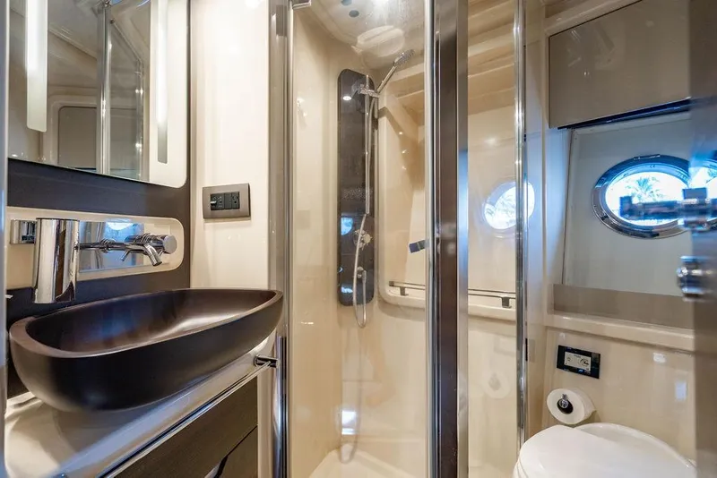 Slide: The Image of Luxurious bathroom in 2015 Azimut Fly 50 yacht, featuring modern fixtures and elegant design. - 118