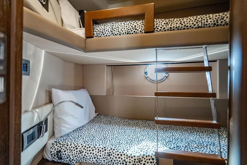 Slide: The Image of Luxurious cabin interior of 2015 Azimut Fly 50 yacht with bunk beds and porthole. - 122