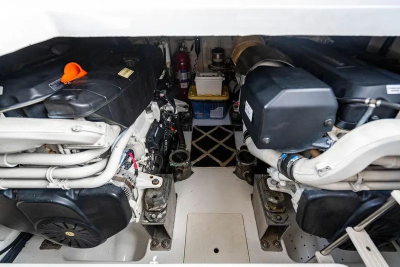 Slide: The Image of Engine room of 2015 Azimut Fly 50 yacht, showcasing dual engines and mechanical components. - 123