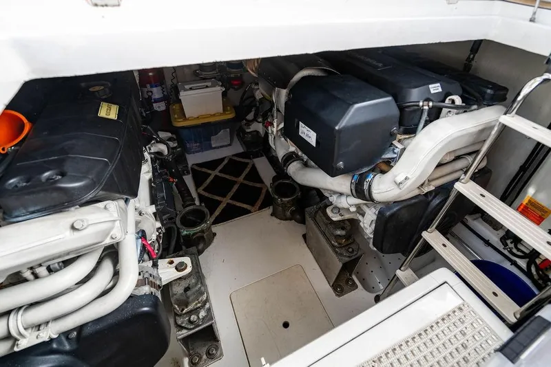 Slide: The Image of Engine room of 2015 Azimut Fly 50 yacht, showcasing dual engines and mechanical components. - 124