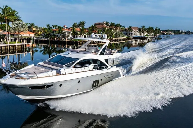 Slide: The Image of Luxurious 2015 Azimut Fly 50 yacht cruising on a scenic waterway. - 20