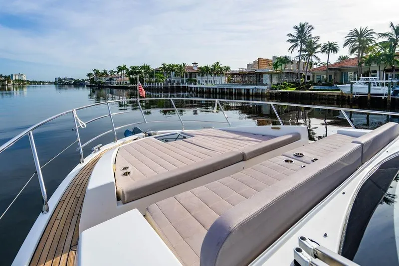 Slide: The Image of Luxurious 2015 Azimut Fly 50 yacht with sunbathing deck, docked by waterfront homes. - 55