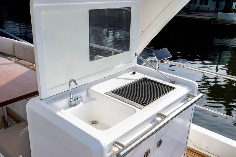 Slide: The Image of Outdoor kitchen on 2015 Azimut Fly 50 yacht with sink and grill. - 63