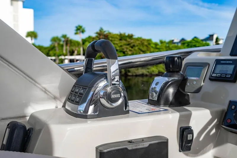 Slide: The Image of Control panel of a 2015 Azimut Fly 50 yacht with Volvo Penta throttle. - 72