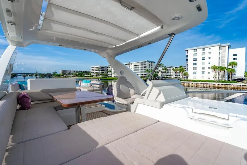 Slide: The Image of Luxurious 2015 Azimut Fly 50 yacht with spacious seating and scenic waterfront view. - 77