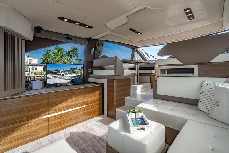 Slide: The Image of Luxurious interior of 2015 Azimut Fly 50 yacht with modern furnishings and scenic window view. - 82