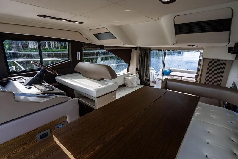 Slide: The Image of Luxurious interior of 2015 Azimut Fly 50 yacht with elegant seating and scenic water view. - 95