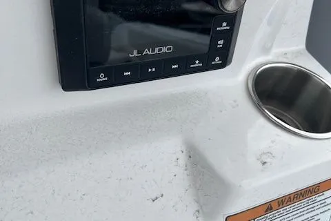 Slide: The Image of 2025 Sea Fox 288 Commander boat console with JL Audio system and cup holder. - 12