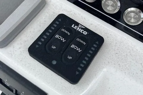Slide: The Image of Lenco control panel on 2025 Sea Fox 288 Commander boat dashboard. - 13