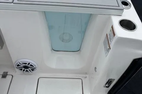 Slide: The Image of 2025 Sea Fox 288 Commander boat interior with cup holders and speaker. - 19