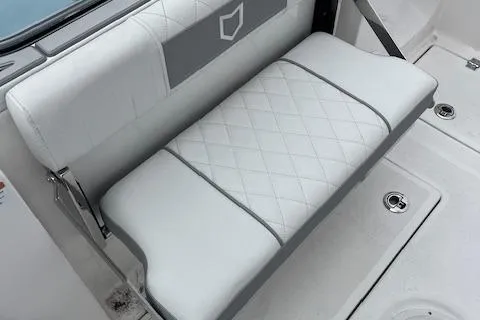 Slide: The Image of 2025 Sea Fox 288 Commander boat seat with diamond-pattern upholstery. - 6