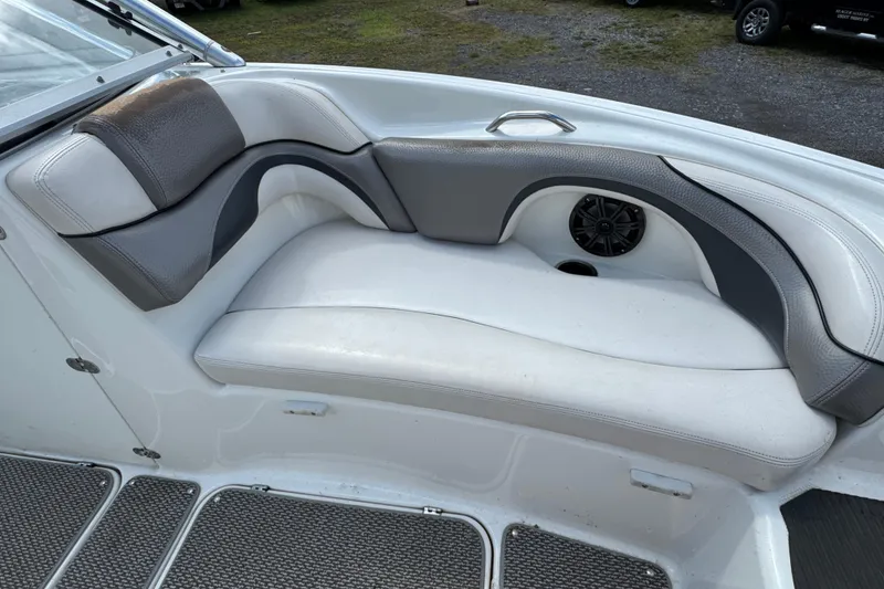 Slide: The Image of 2008 Yamaha Boats 212X interior seating with gray and white upholstery. - 7