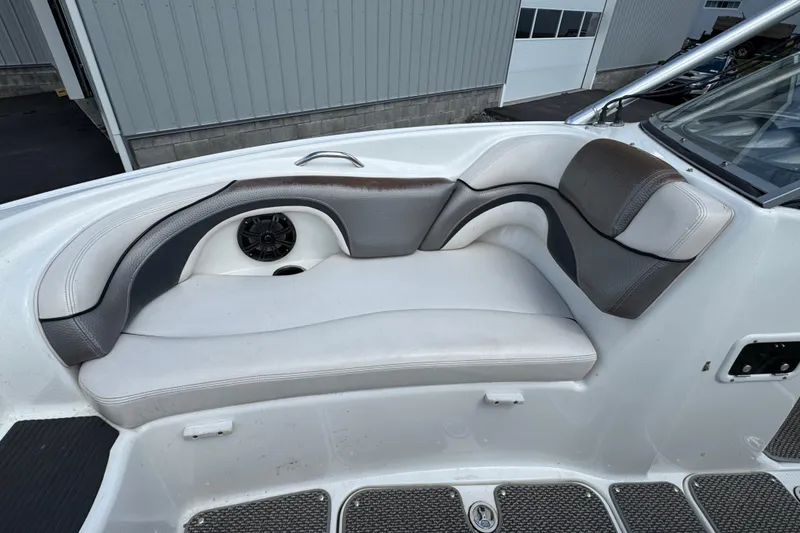 Slide: The Image of 2008 Yamaha Boats 212X interior seating with gray and white upholstery. - 8