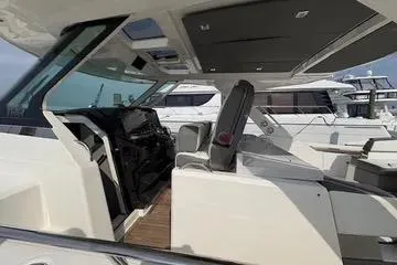Slide: The Image of 2021 Tiara Yachts 38 LS luxury boat interior with modern design and sleek finishes. - 11