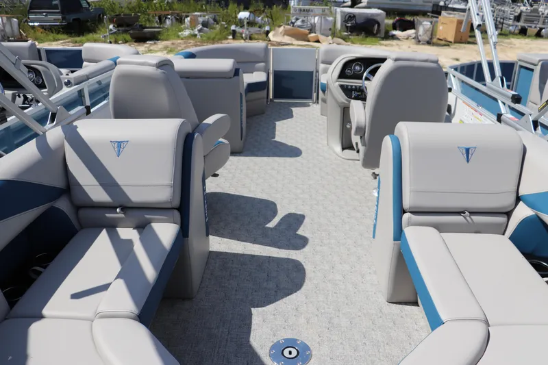 Slide: The Image of Luxurious interior of 2025 Trifecta 22 RF LE 2.75 pontoon boat with plush seating. - 11