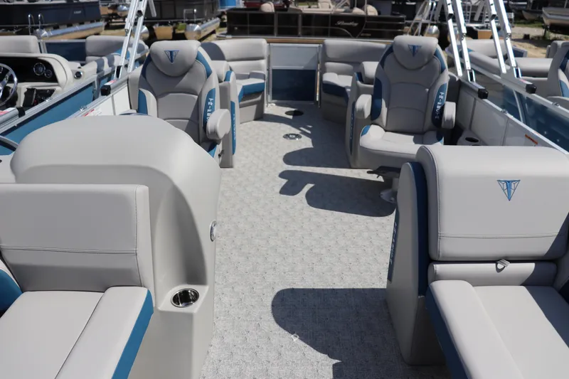 Slide: The Image of Luxurious interior of 2025 Trifecta 22 RF LE 2.75 pontoon boat with plush seating. - 3