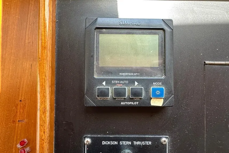 Slide: The Image of Simrad autopilot control panel on 1983 Kadey-Krogen Krogen 42 Trawler. - 18
