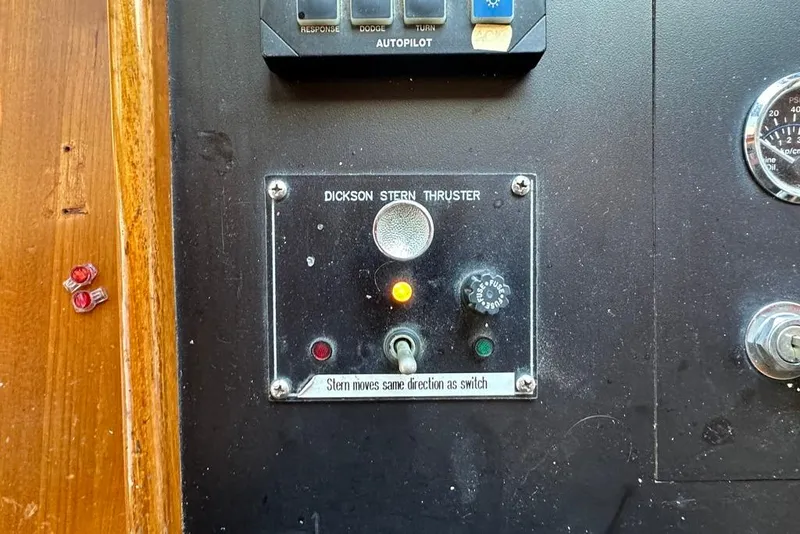 Slide: The Image of Control panel of 1983 Kadey-Krogen Krogen 42 Trawler with stern thruster controls. - 23