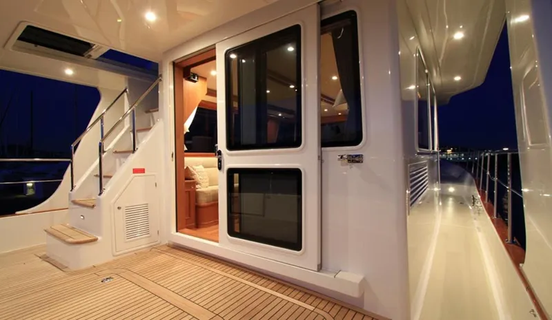 Slide: The Image of 2015 Grand Banks 43 Heritage EU yacht deck and cabin entrance at night. - 81