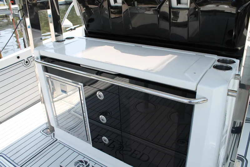 Slide: The Image of 2021 Jeanneau Leader 10.5 boat interior with sleek cabinetry and modern design. - 20