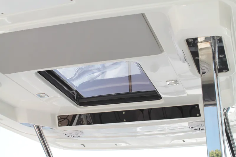 Slide: The Image of Ceiling view of 2021 Jeanneau Leader 10.5 boat with skylight and speakers. - 28