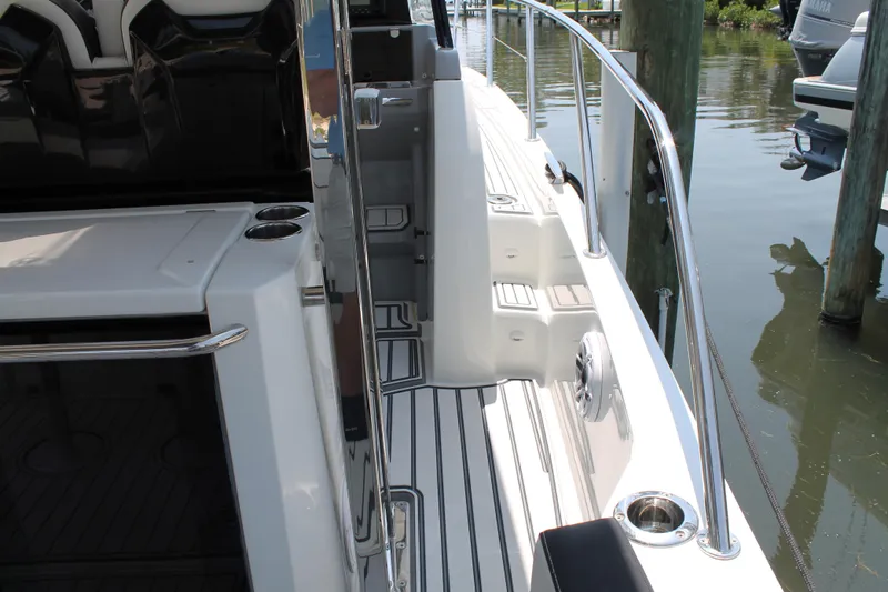 Slide: The Image of 2021 Jeanneau Leader 10.5 boat deck with sleek design and stainless steel railings. - 31