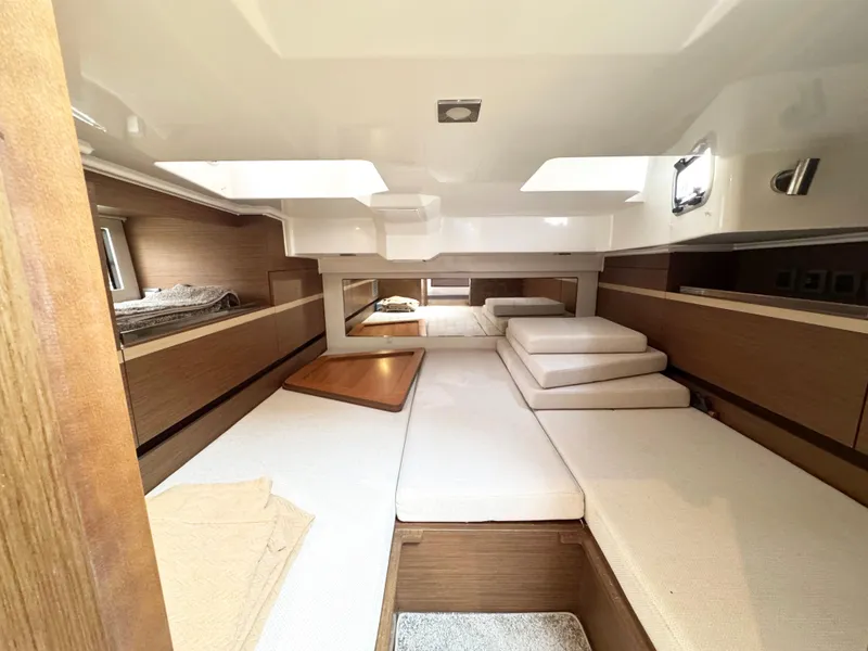 Slide: The Image of Interior of 2021 Jeanneau Leader 10.5 boat, featuring spacious seating and modern design. - 40