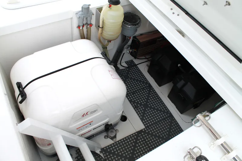 Slide: The Image of Engine compartment of 2021 Jeanneau Leader 10.5 with generator and equipment. - 48