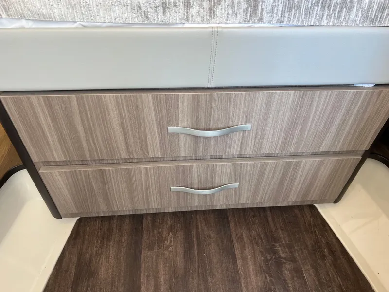 Slide: The Image of Interior of 2022 Regal 36GC boat, featuring modern helm and seating. - 13