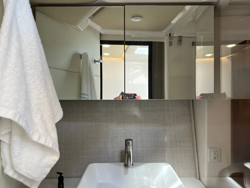 Slide: The Image of Control panel of 2022 Regal 36GC boat with Garmin navigation system. - 15