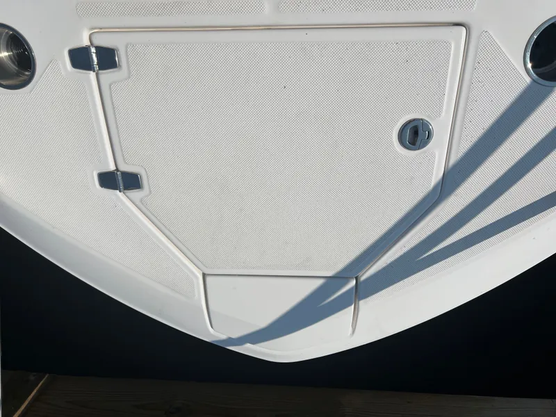 Slide: The Image of 2022 Regal 36GC interior with modern cabinetry, wall-mounted TV, and sleek design. - 24