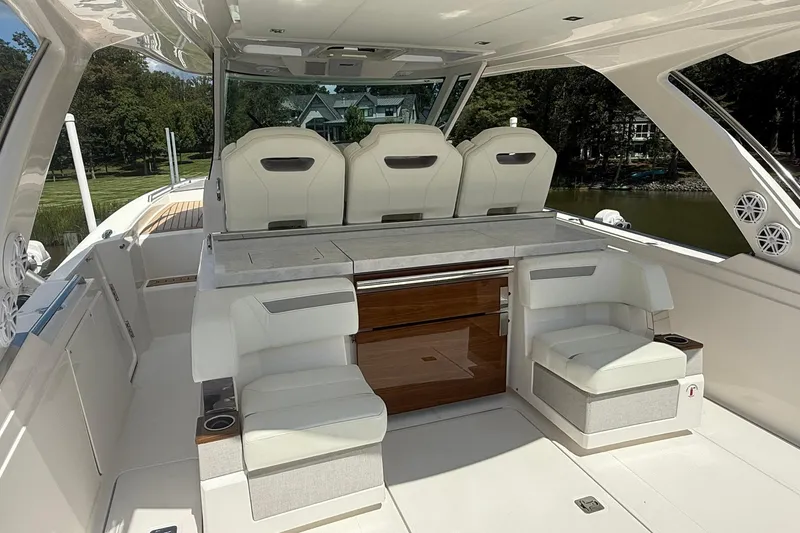 Slide: The Image of 2024 Tiara Yachts 38 LS interior with luxurious seating and modern design. - 11