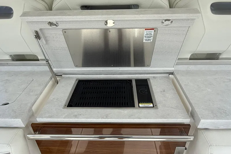 Slide: The Image of 2024 Tiara Yachts 38 LS yacht grill station with sleek countertop design. - 13