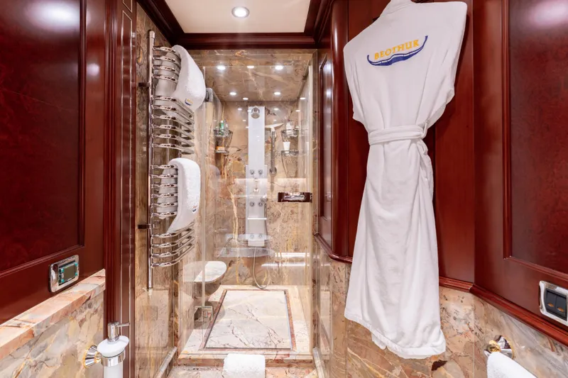 Slide: The Image of Luxurious yacht bathroom with marble shower, towel rack, and robe; Kuipers Woudsend Doggersbank Offshore 2008. - 25