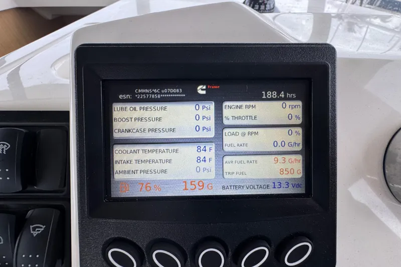 Slide: The Image of Display panel of 2023 Beneteau Swift Trawler 35 showing engine metrics and fuel data. - 35