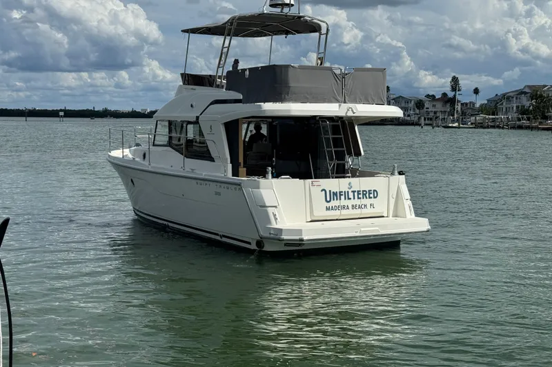 Slide: The Image of 2023 Beneteau Swift Trawler 35 on water near Madeira Beach, Florida. - 6