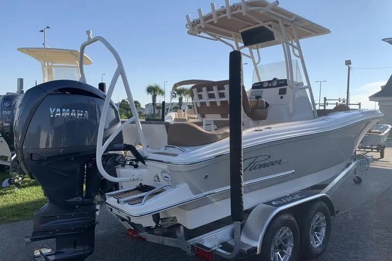Slide: The Image of 2026 Pioneer ISLANDER 202 boat with Yamaha engine on trailer, outdoor setting. - 4