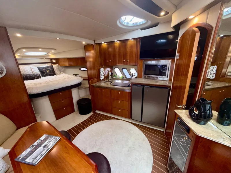 Slide: The Image of Luxurious interior of 2009 Cruisers Yachts 420 Coupe with modern amenities and elegant design. - 26