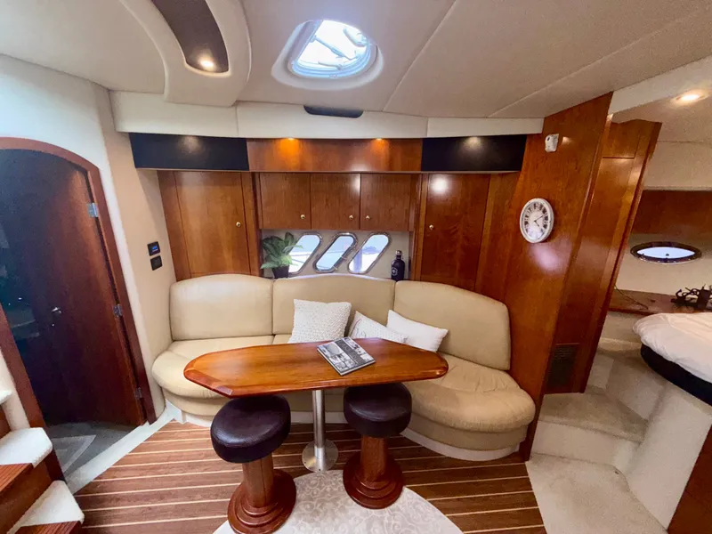 Slide: The Image of Luxurious interior of 2009 Cruisers Yachts 420 Coupe with elegant seating and wooden finishes. - 35