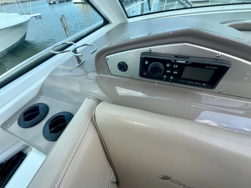 Slide: The Image of Interior of 2009 Cruisers Yachts 420 Coupe with Fusion audio system and cup holders. - 41