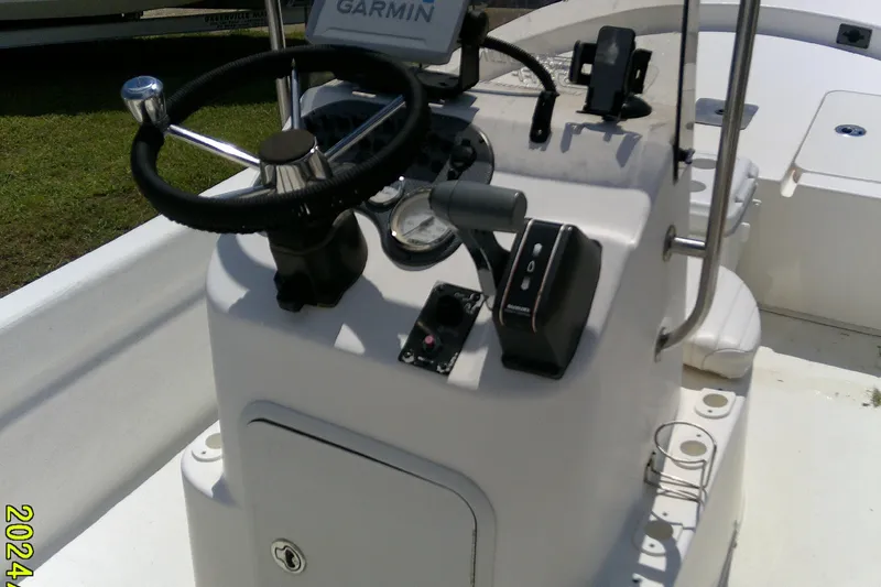 Slide: The Image of 2011 Carolina Skiff JVX18CC boat console with Garmin navigation system. - 13