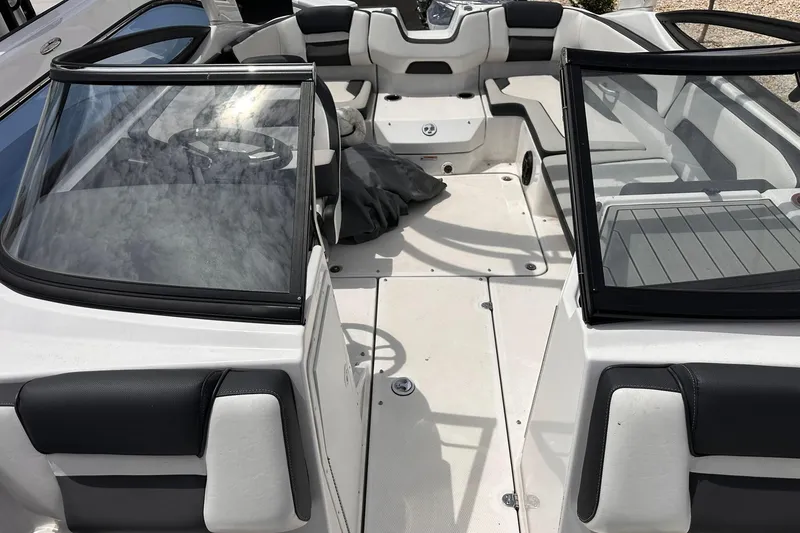Slide: The Image of 2024 Yamaha Boats AR195 interior with sleek seating and modern design. - 12