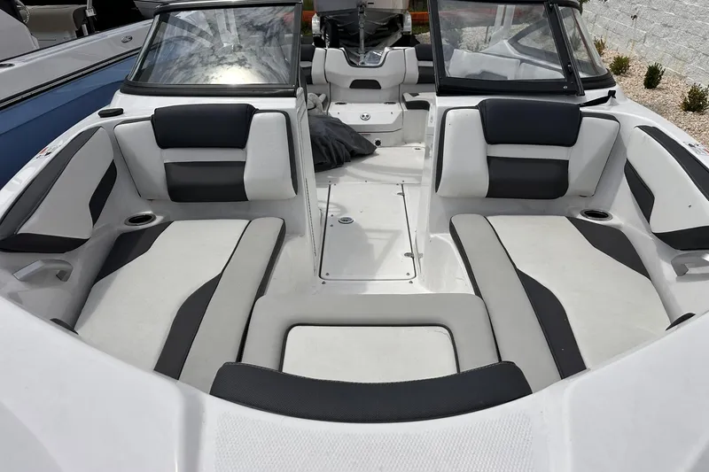 Slide: The Image of 2024 Yamaha Boats AR195 interior with sleek seating and modern design. - 18