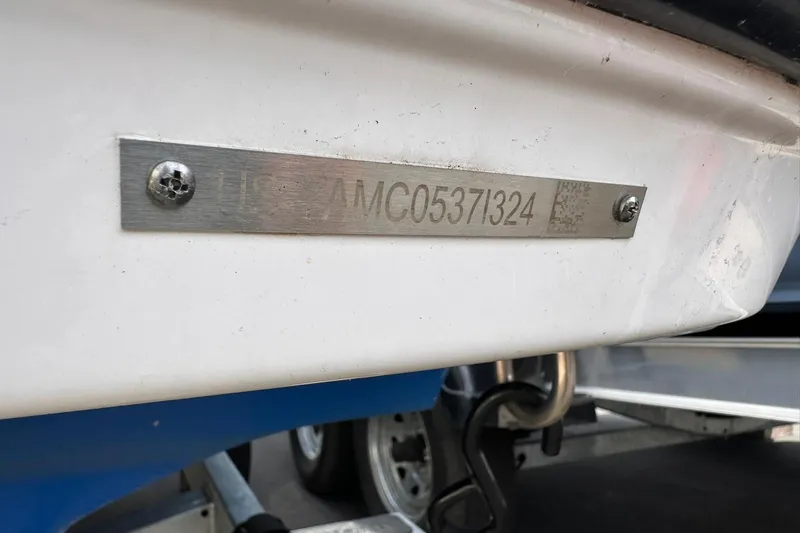 Slide: The Image of 2024 Yamaha Boats AR195 hull identification number plate close-up. - 20