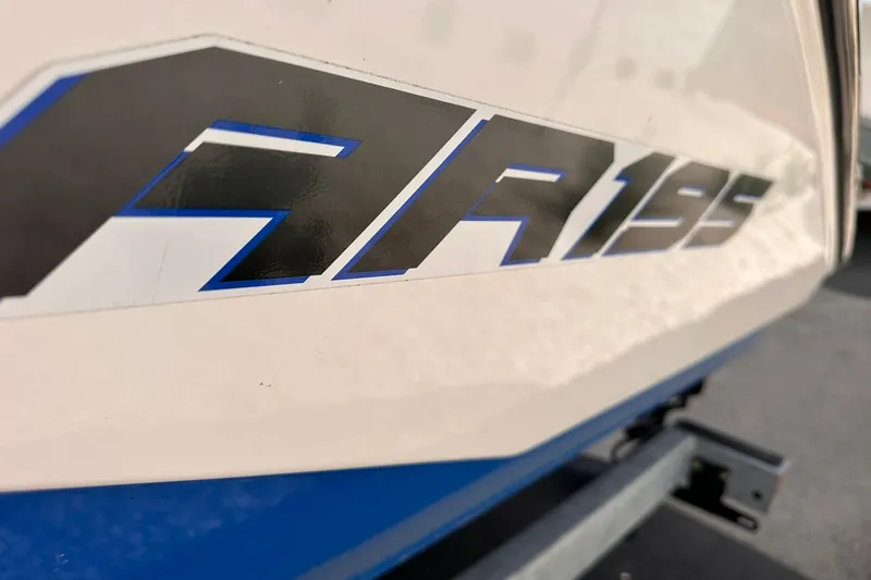 Slide: The Image of 2024 Yamaha Boats AR195 logo on boat exterior, close-up view. - 5
